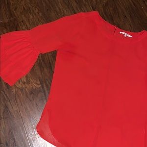Red blouse with bell sleeves